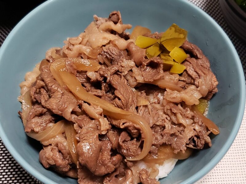 Beef bowl with pickled pesora topping