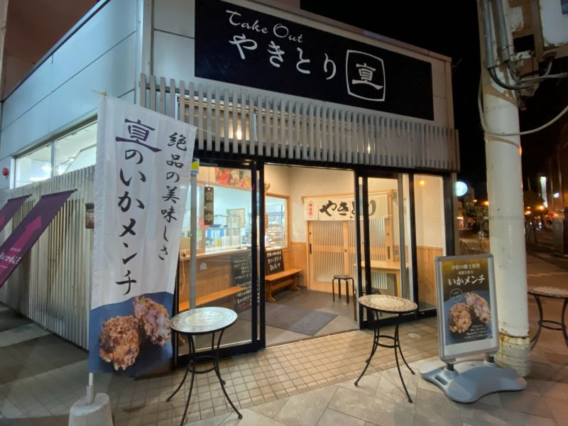 Upon entering, the eat-in area is to the right, and there are tables outside for takeout orders