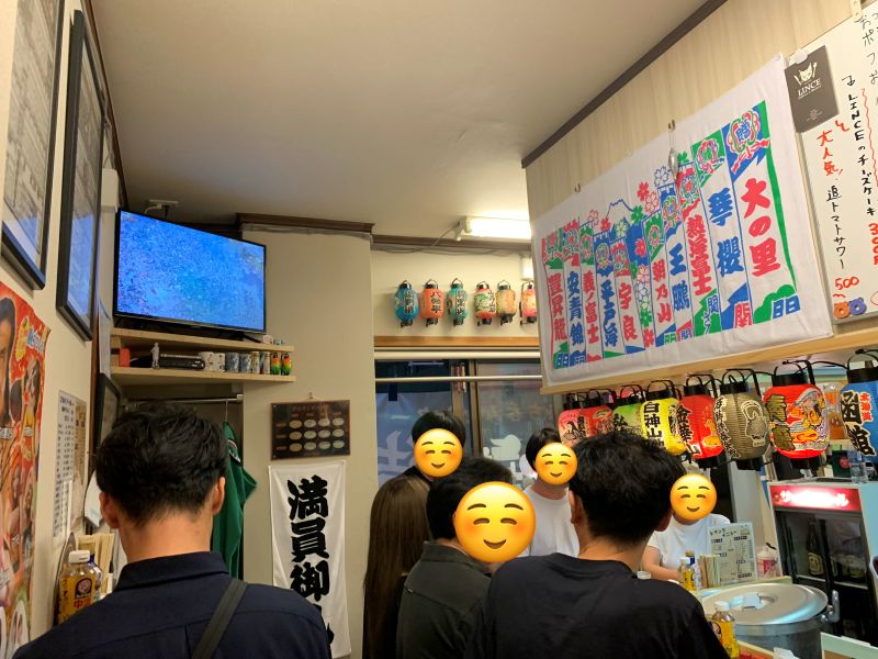 From our two-person table, we could see the restaurant was full and had a friendly atmosphere. The kitchen was located at the back right of the counter on the right side