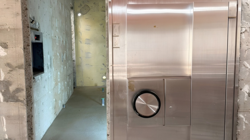 The heavy door remaining in the bank's vault